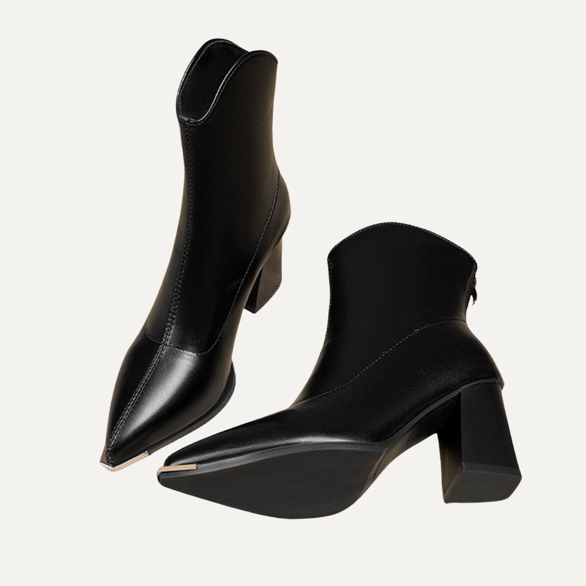 Odette ankle boots in black, side and sole view