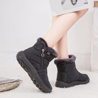Nell quilted snow boots in black worn, side view