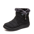 Nell black snow boot, side view with zip