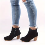 Liv black suede-effect ankle boots worn, front view