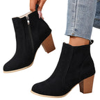 Liv black heeled ankle boots worn, inside zip view