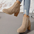 Liv beige ankle boots with stacked-effect block heel, worn