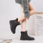 Nell quilted snow boots in black worn, side zip