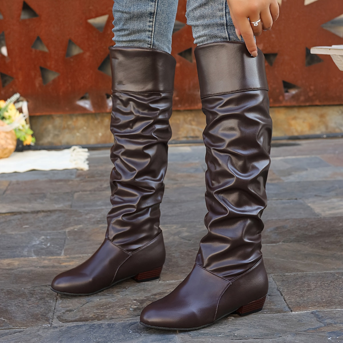 Alva brown ruched flat knee-high boots worn