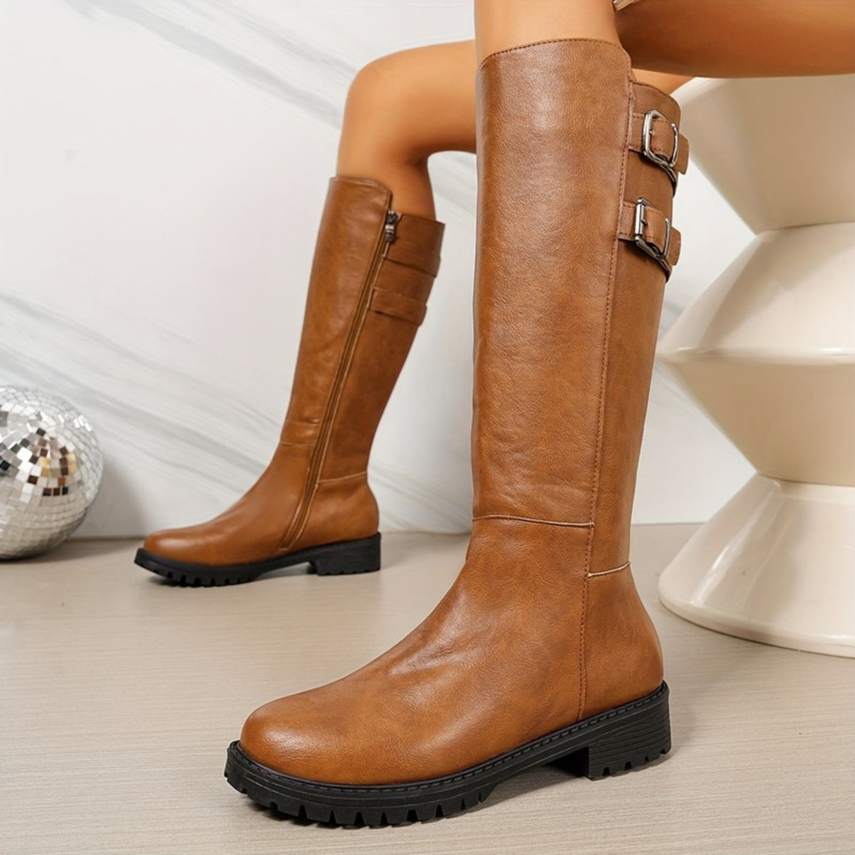 Brenna brown riding boots showing the inside zip
