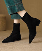 Camille black pointed sock ankle boots, worn with jeans