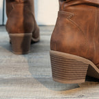 Clemency cowboy boot close-up of the 5.5 cm stacked-effect block heel