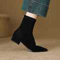 Camille black stretch sock ankle boot, side view with back zip and block heel