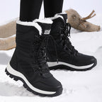 Freya black snow boots, worn in the snow