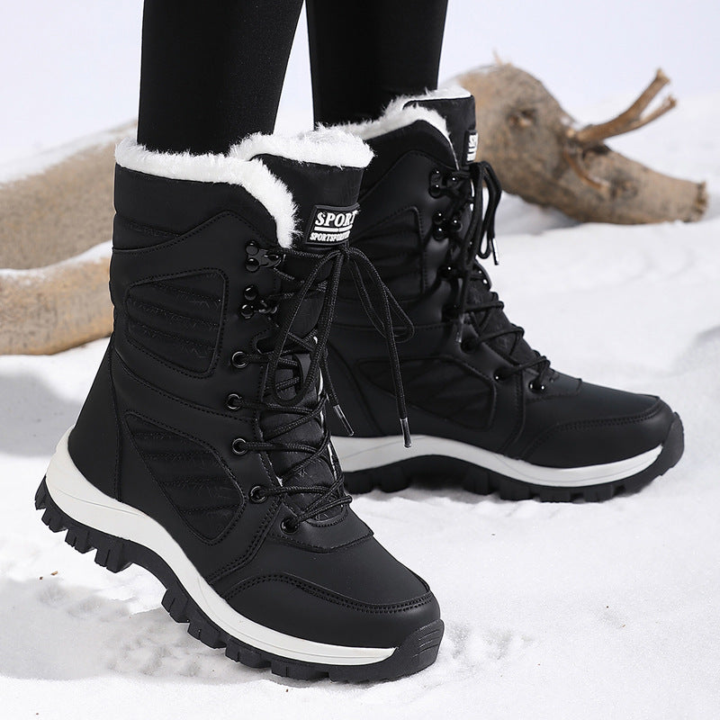 Freya black snow boots, worn in the snow