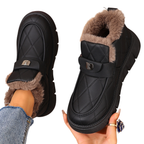 Embla black snow boots side view with faux-fur collar
