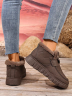 Embla brown snow boots back view showing the ridged sole