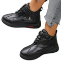 Gunnvor black plush-lined high-top winter trainers worn