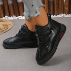 Gunnvor black trainers with elastic lace loops