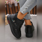 Gunnvor black trainers, side view