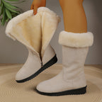 Hedda beige snow boots open side zip showing the plush faux-fur lining