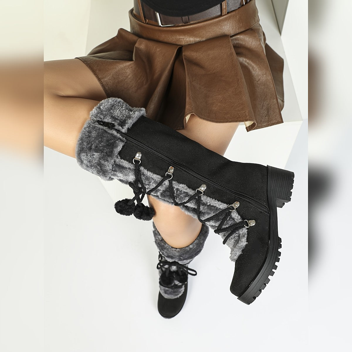 Hjordis lace-up boots styled with a skirt