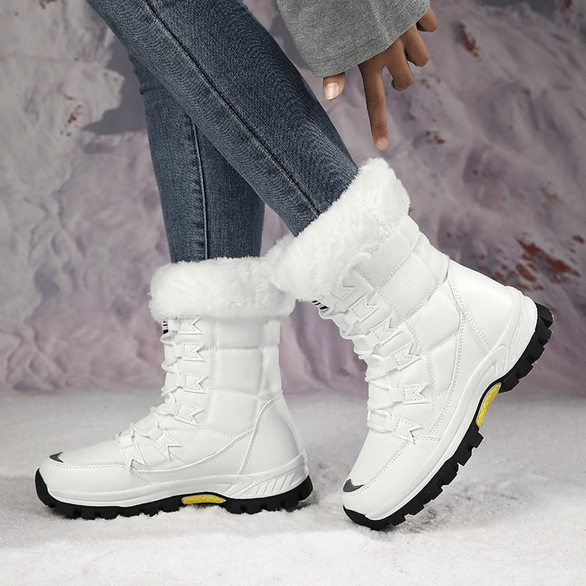 Linnea white snow boots worn, side view with faux-fur cuff
