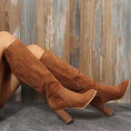 Malin brown knee-high boots worn, side zip
