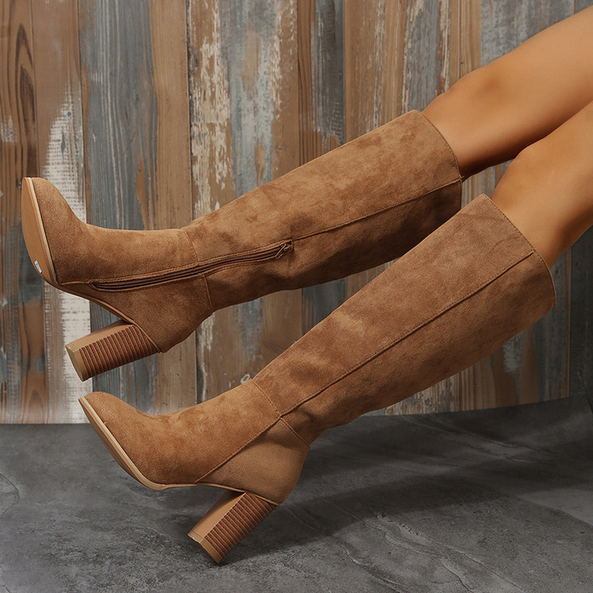 Malin tan knee-high boots worn, side zip