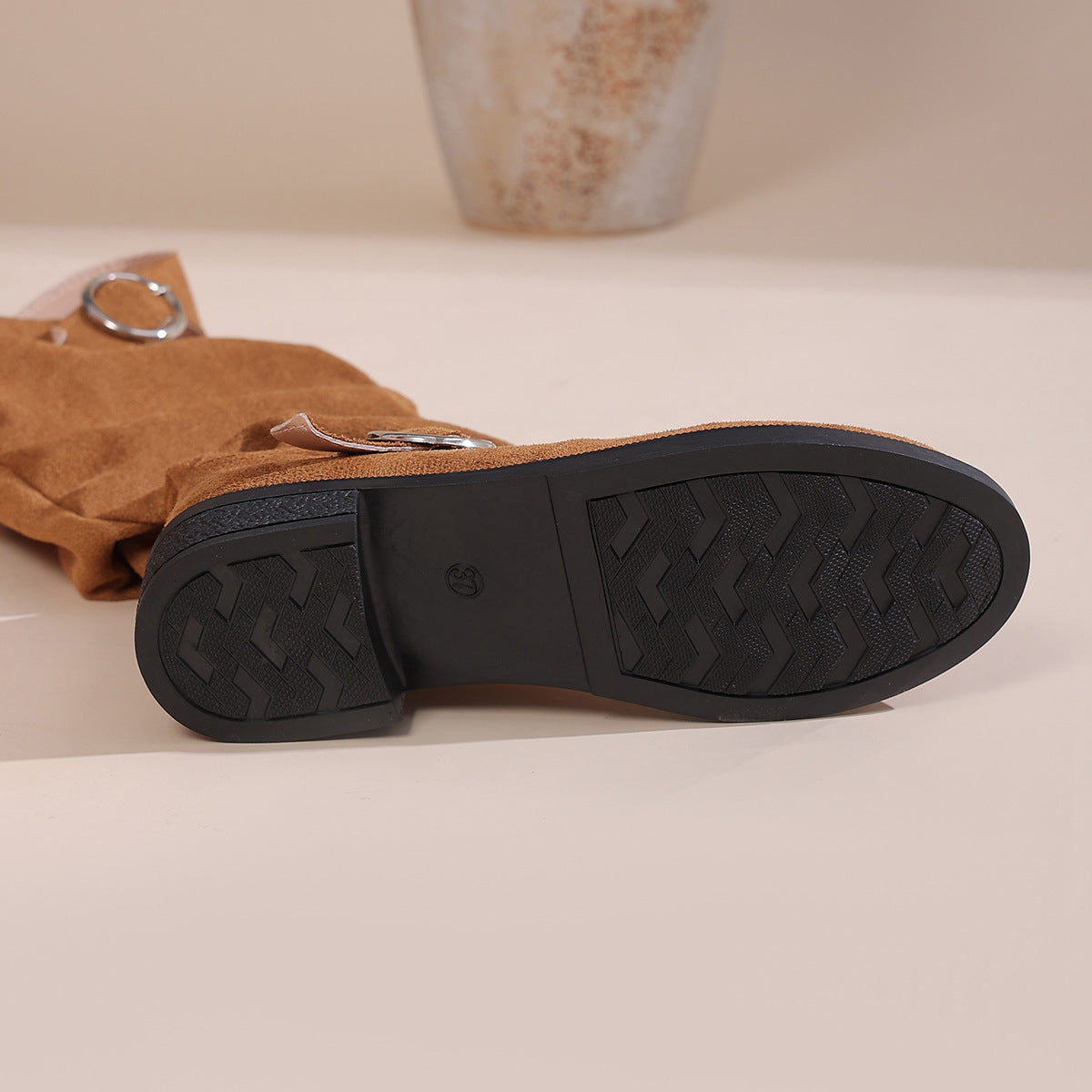 Maren slouch boots textured sole and low heel