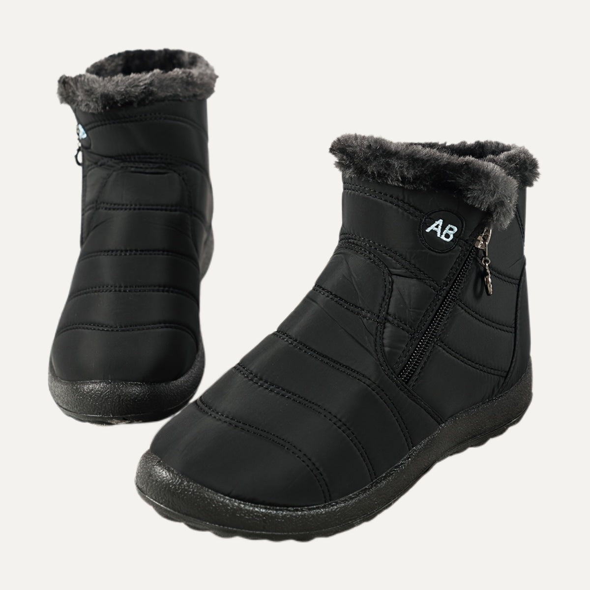 Nell quilted side-zip snow boots in black