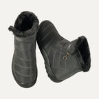 Nell quilted side-zip snow boots in grey, showing the plush lining
