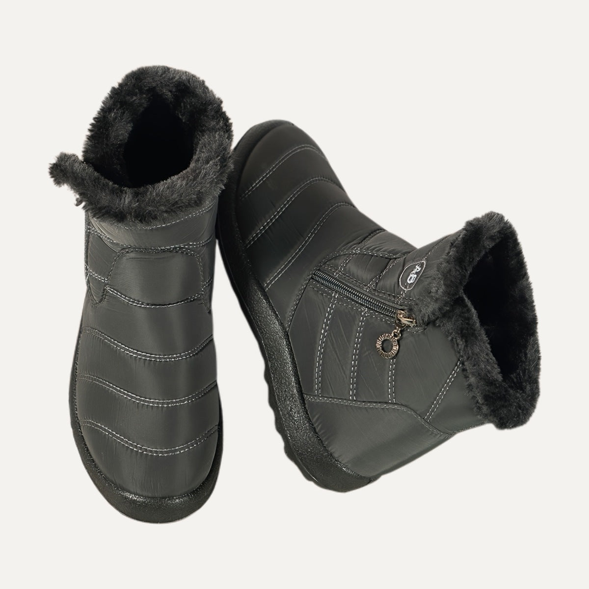 Nell quilted side-zip snow boots in grey, showing the plush lining
