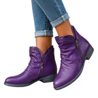 Isolde purple ruched ankle boots worn with jeans