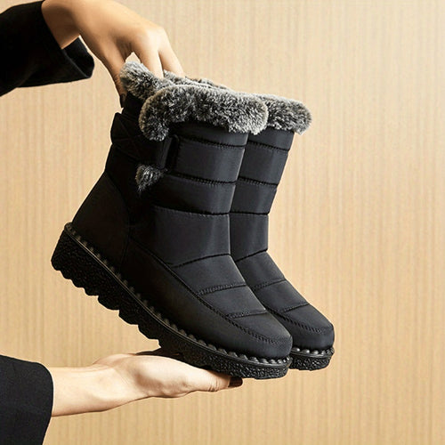 Ronja black quilted snow boots with faux-fur collar