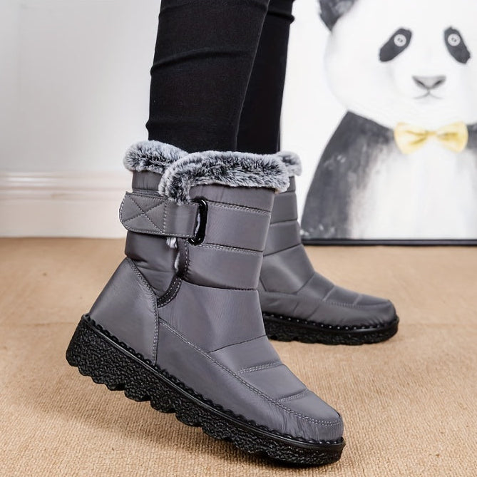 Ronja grey snow boots with hook-and-loop strap, worn