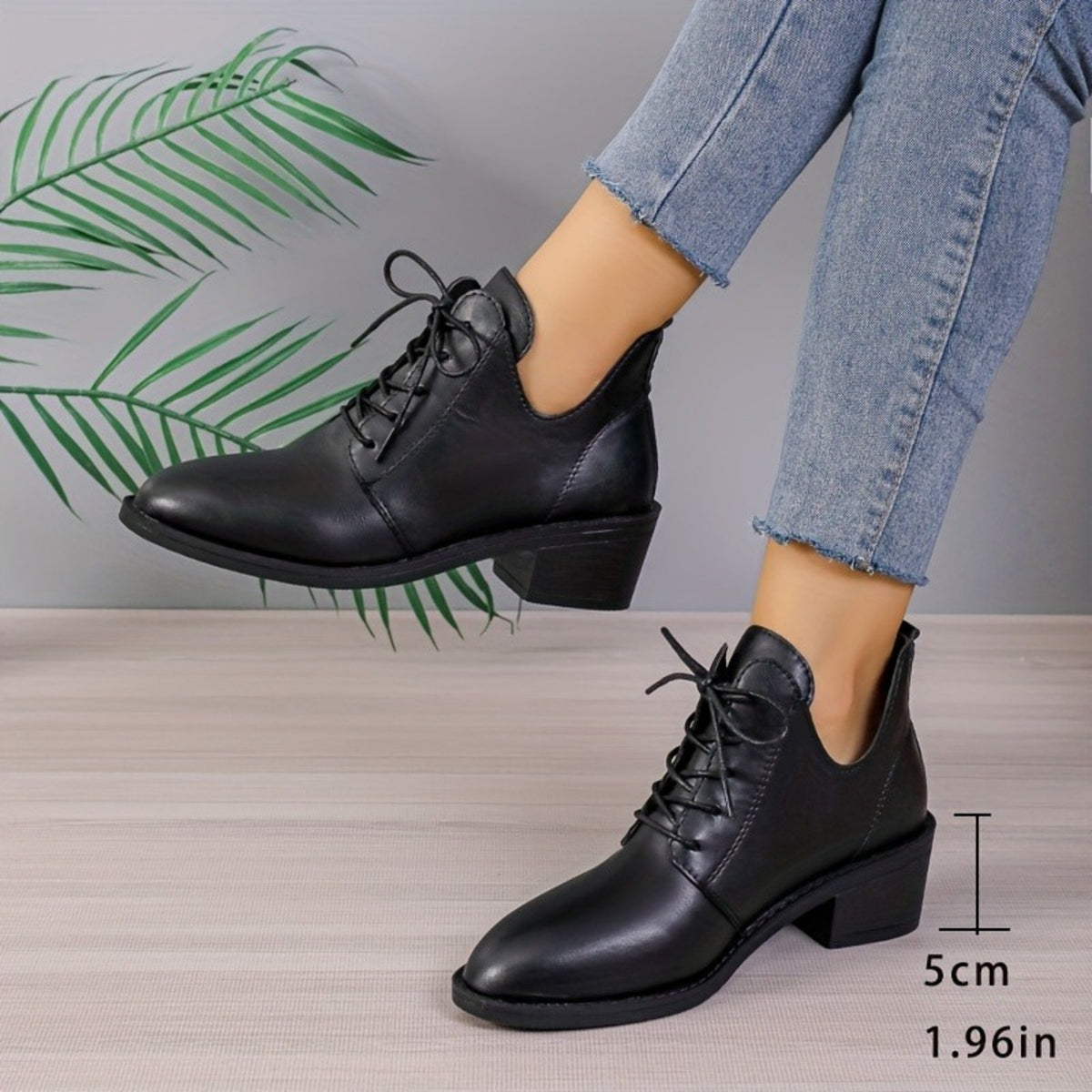 Rosalind black ankle boots showing the 5 cm block heel
