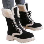 Runa black faux-fur trim lace-up mid-calf snow boots worn with jeans
