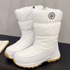 Sigrid white puffer snow boots with snowflake badge, pair