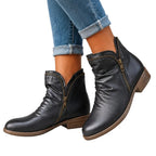 Isolde black ruched ankle boots worn with jeans