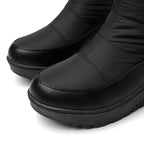 Solveig snow boots toe close-up: quilted upper and smooth toe panel
