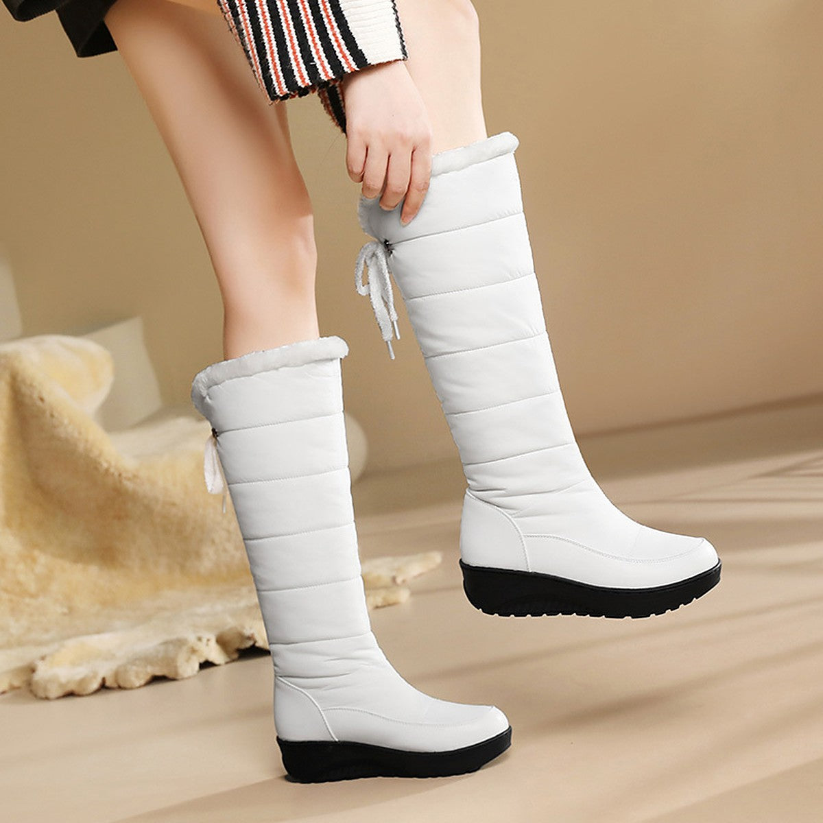 Solveig white faux-fur lined boots worn, walking