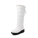 Solveig white puffer snow boot, side view with back tie