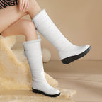 Solveig white snow boots worn, side view