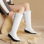 Solveig white winter boots worn, seated