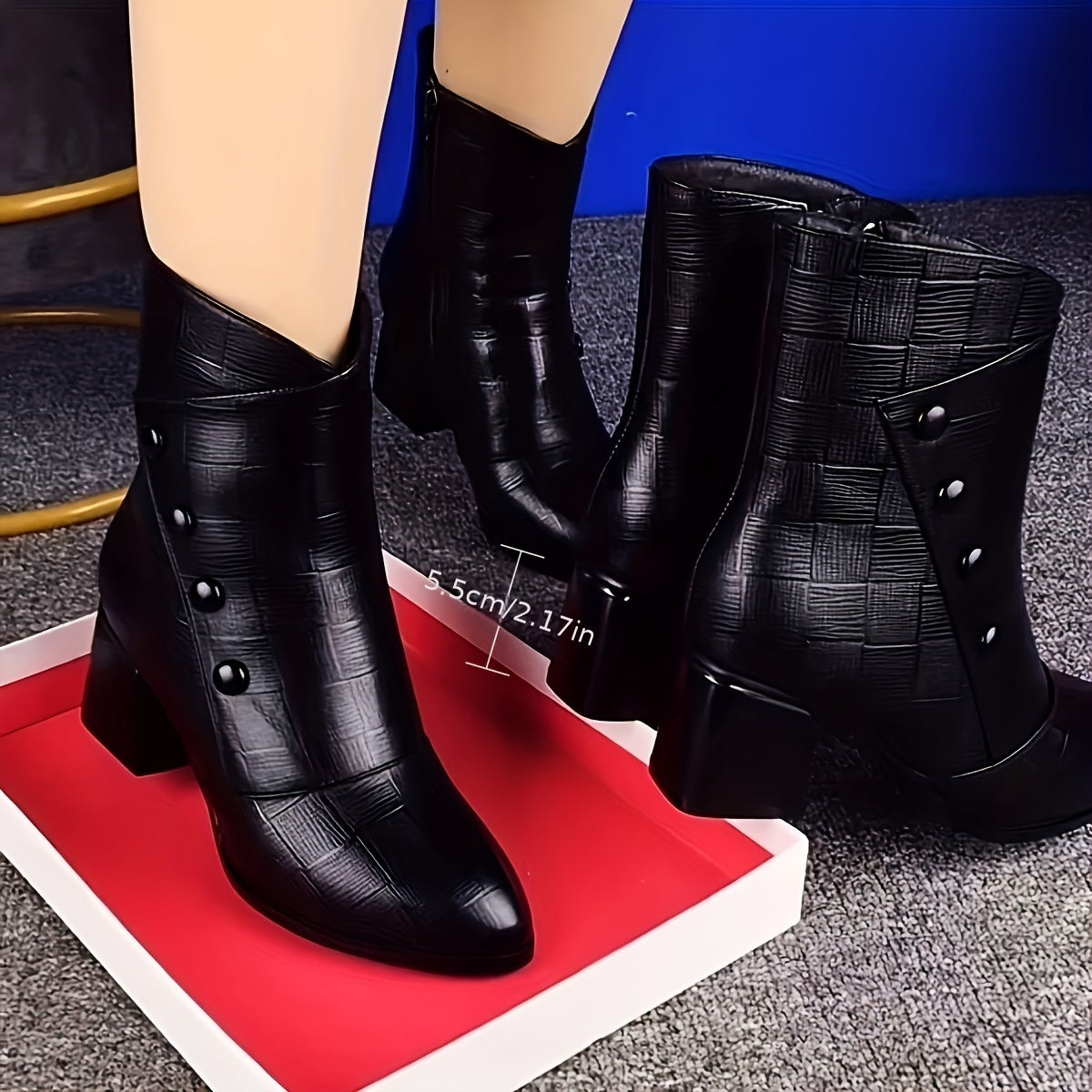 Thessaly ankle boot side view showing the 5.5 cm block heel and button panel