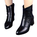 Thessaly black heeled ankle boots with button-trim panel and side zip, pair