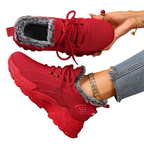 Tindra red winter trainers, showing the faux-fur lining