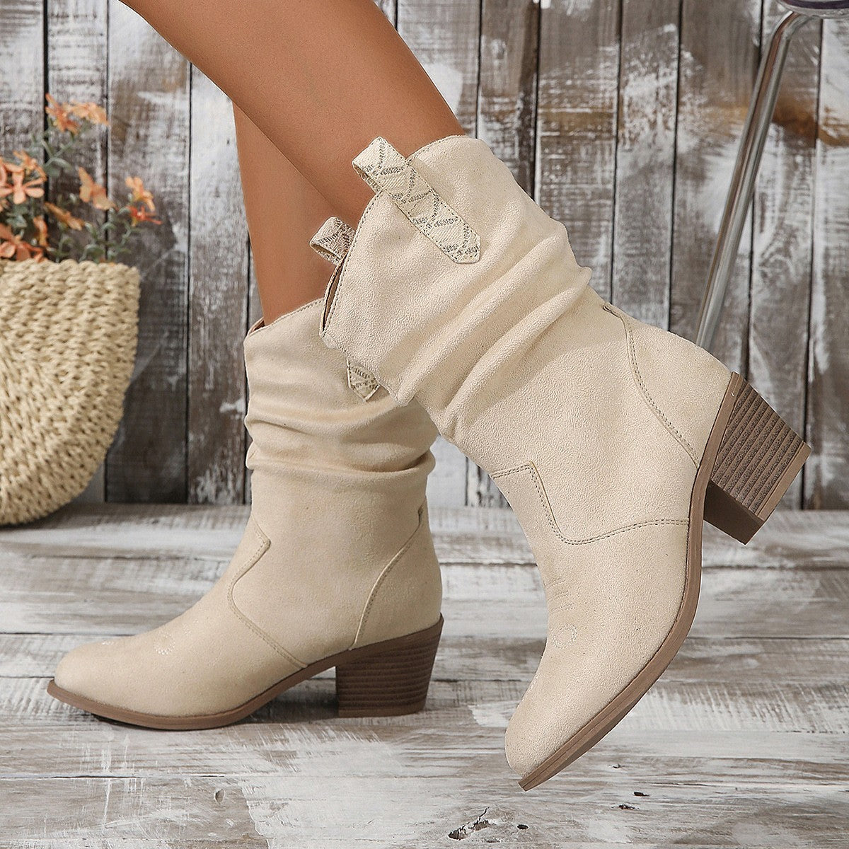 Torvild cream cowboy boots worn