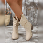 Torvild cream slouch boots, side view