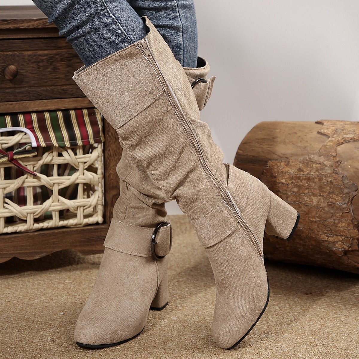 Tyra beige slouch boots showing the side zip