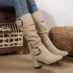 Tyra beige slouch boots worn, side view