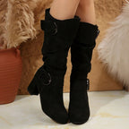 Tyra black slouch mid-calf boots worn, front view with ring buckles