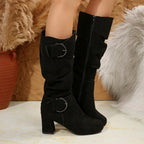 Tyra black slouch mid-calf boots worn, inner side zip