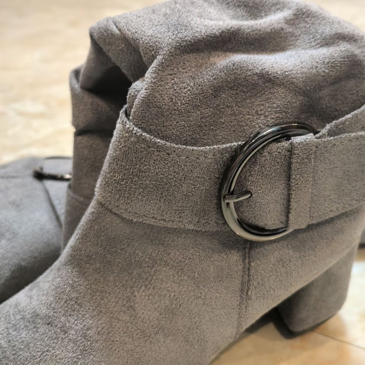 Tyra grey ring buckle and suede-effect finish, close-up